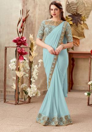 Fresh Aqua blue color ensembles embarks a heavenly personality. Floral embroidered blouse encash over the beauty of this ready to wear saree. 