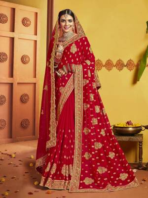 Grab This Pretty Elegant Looking Designer Saree In Red Color Paired With Contrasting Red Colored Blouse. This Saree And Blouse Are Silk Based Beautified With Heavy Jari Embroidery & Embroidery Border. Buy Now.