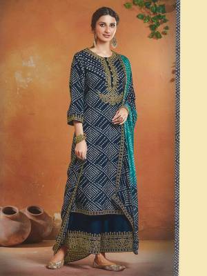 Tusser silk Shtraight Kammeez Plazzo Style Salwar Kameez. The Floral, Embroidered work, Multi Work Personifies The Entire Appearance. Comes with Matching Plazzo in bottom side Embroidered work, and full Chinon Dupatta with 2 side embroidery.