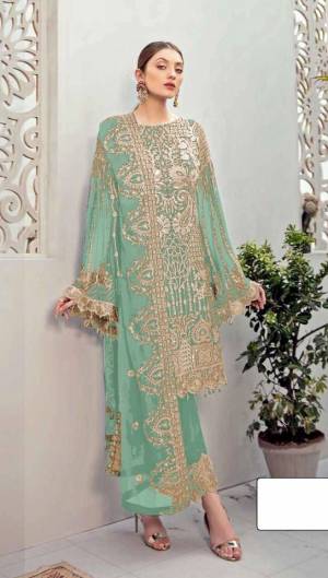 Light Green color Pakistani Suit for All Event Georgette Fabric Material. Top fabric Faux Georgette with attached santoon inner, Bottam Fabric Shantoon And Faux Georgette Dupatta And Heavy Embroidery work for new design Pakistani Suit.