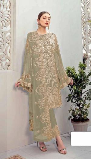 Beige color Pakistani Suit for All Event Georgette Fabric Material. Top fabric Faux Georgette with attached santoon inner, Bottam Fabric Shantoon And Faux Georgette Dupatta And Heavy Embroidery work for new design Pakistani Suit.