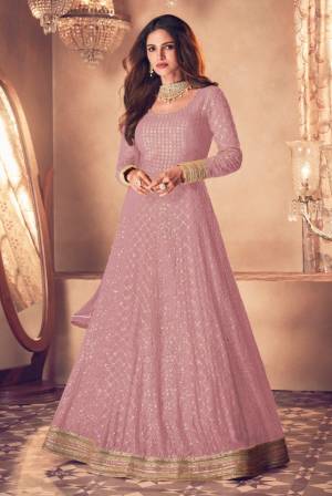 Coffee heavily embroidered Faux Georgette Anarkali Salwar suit with Pant bottom and four side embroidered work dupatta,heavily embroidered Anarkali Suite make for the most comfortable yet fancy ensemble.