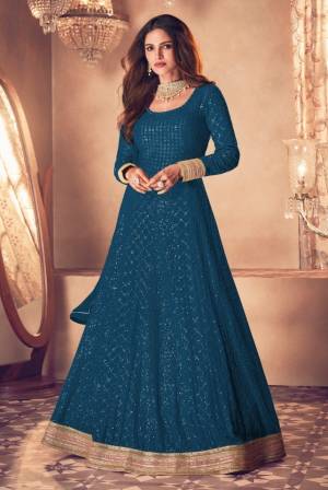 Green heavily embroidered Faux Georgette Anarkali Salwar suit with Pant bottom and four side embroidered work dupatta,heavily embroidered Anarkali Suite make for the most comfortable yet fancy ensemble.