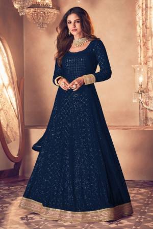 Blue heavily embroidered Faux Georgette Anarkali Salwar suit with Pant bottom and four side embroidered work dupatta,heavily embroidered Anarkali Suite make for the most comfortable yet fancy ensemble.