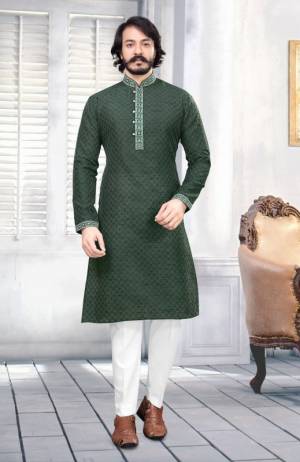 Traditional Indian Wear Long Kurta made from Art Silk. The solid style pattern adds to the regal style of the kurta. Traditionally worn over Indian Polo Pant  but can also be worn over Denims or Linen Pants. 