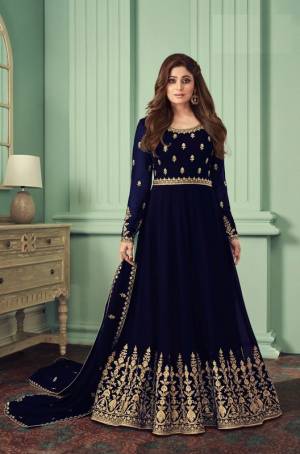 Blue heavily embroidered Faux Georgette Gown Type Anarkali Salwar suit with Shantoon Pant bottom and four side embroidered work dupatta,heavily embroidered Anarkali Suit make for the most comfortable yet fancy ensemble.