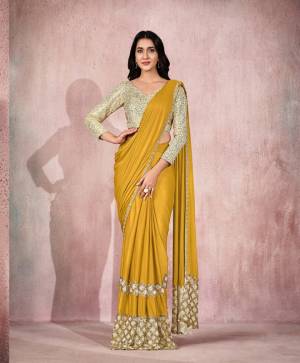 Mustard Lycra Embroidery Designer Saree With Blouse.