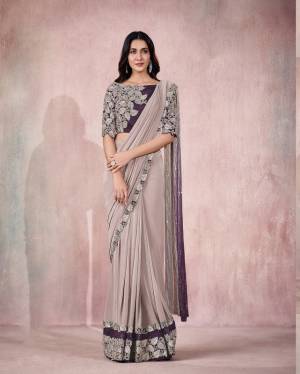 Lavender Lycra Embroidery Designer Saree With Blouse.