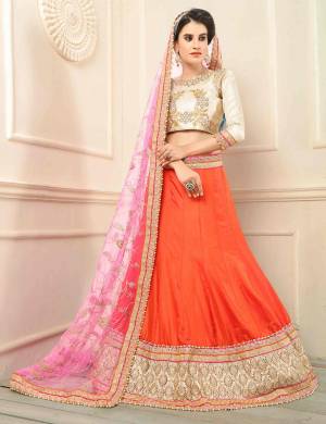 Look Divalicious Adorning This Orange Colored Designer Lehanga. It Has Captivating  Embroidery  Designs.Wear it & Shine.
