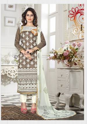 Elegance And Charm Is What You Will Exude Once You Get Dressed In An Ethnic Ensemble Tailored From This Suit Set. Its Tan Khaki Color And Charming Embroidered Add To Its Ethnic Appeal  While The Chanderi Cotton Fabric Ensures Superb Comfort Throughout The Day. Grab It Now.