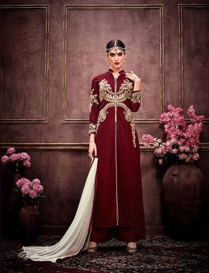 You Will Certainly Grab All The Attention Of Onlookers In The Next Party You Visit. Get Ready For The Next Party With This Maroon Colored Suit paired With Maroon Bottom And Contrasting Cream Colored Dupatta. The Top Is Fabricated On Faux Georgette And Bottom Is Of Santoon. This Skin Soft Fabricated Suit Will Keep You Comfortable All Day Long.