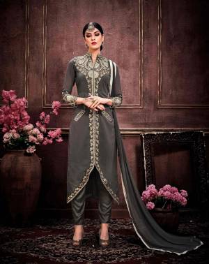 Enhnace Your Personality Wearing This Grey Colored Suit At The Next Function Taking At Your Place.  This Suit is Fabricated On Faux Georgette And Bottom Is Fabricated On Santton. Both are Skin Soft Fabric Which Will Keep you Comfortable Troughtout The Gala.