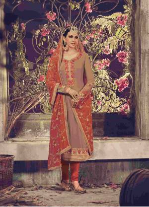 Enhance Your Personality With This Simple And Elegant Suit In Beige Color And Paired With Orange Colored Bottom And Dupatta. This Suit Is Fabricated On Georgette Which Is Light In Weight So That You Can Carry It All Day Long With Ease And Comfort.