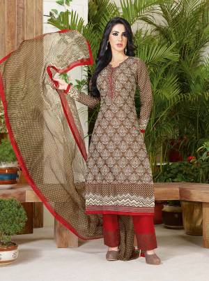 Enhance Your Personality With This Light Brown Colred Suit Paired With Red Colored Bottom. This Dress Material Is Fabricated On Cotton Which Is Light In Weight And Easy To Carry All The Long. Make This Stitch As Chudiadar Or Plazzo According To Your Comfort.