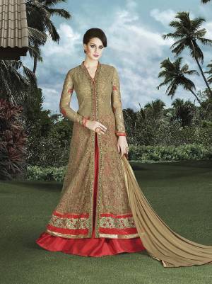 Fill Up Your Wardrobe With This Whole New Collection In Indo-Western Dress. This Dress Is Fabricated On Net Beautified With Thread Embroidery And Stone Work Paired With Contrasting Red Colored Art Silk Fabricated Pants. Buy This Suit Now.