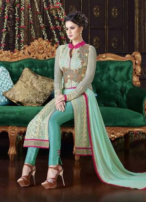 Another Pretty Colored Suit Is Here Just For You. Enhance Your Ethenic With This Sea Green Colored Indo-Western Suit. This Suit Is Fabricated On Faux Georgette Paired With Jacquard Silk Fabricated Bottom. Adorn This Indo-Western Suit Paired With Pants. Buy This Suit Now.