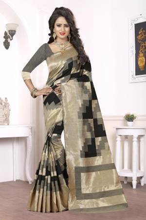 For A Bold And Beautiful Look In Ethnic Wear  Grab This Black And Beige Colored Saree Fabricated On Kanjivaram Art Silk That Gives A Royal Look To Your Personality. Buy this Saree Now. 