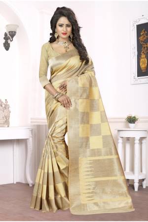Look Simple And Elegant In This Cream And Beige Colored Fabricated On Kanjivaram Art Silk Which Is Comfortable And Easy To Carry All Day Long. Pair This Up With Delicate Pearl Earrings And Complete The Look.