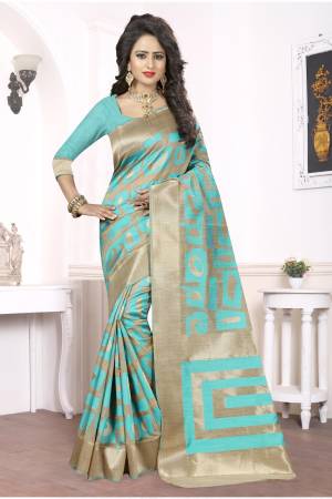 Add A Liitle Pinch Of Colors To Your Attire With Contrasting Light Colors. Grab This Aqua Blue And Beige Colored Saree Paired With Aqua Blue Colored Blouse. This Saree Is Fabricated On Kanjivaram Art Silk Which Is Light In Weight And Easy To Drape. Buy This Saree Now.