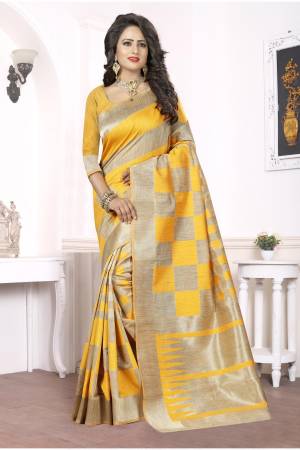 Shine Bright With This Musturd And Beige Colored Saree Paired With Musturd Colored Blouse. This Saree Is Fabricated On Knjivaram Art Silk. Buy This Lovely Saree Now.