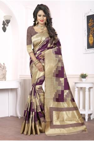 Color Which Is Available Very Less In Market. Grab This New And Different Wine And Beige Colored Saree Paired With Wine Colored Blouse. This Pretty Unique Saree Is Fabricated On Kanjivaram Art Silk  Buy This Saree Now. 