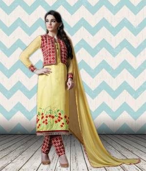 Look Pretty In This Yellow And Red Colored Suit Paired With Red Colored Bottom And Yellow Colored Dupatta. This Suit Is Fabricated On Cotton Satin Paired With Lawn Cotton Bottom And Chiffon Dupatta. Fabrics Enusres Superb Comfort Throughout The Day. Buy Now.