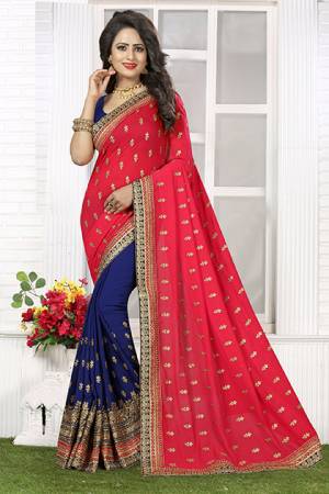 Look Beautiful In This Dark Pink and Navy Blue Colored Saree Fabricated On Crush Chiffon Paired With Navy Blue Colored Blouse. This Pretty Saree Is Beautified With Embroidery All Over And Lace Border. Buy This Saree Now.