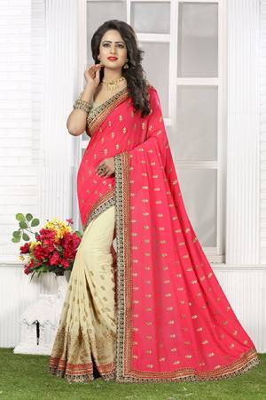 Simple And Elegant  Add This Pink And Cream Colored Saree To Your Wardrobe Paired With Cream Colored Blouse. This Saree Is Fabricated On Crush Chiffon Which Is Light Weight And Easy To Drape. This Saree Is Beautified With Embroidered Patches All Over And Lace Border. Buy This Saree Now. 