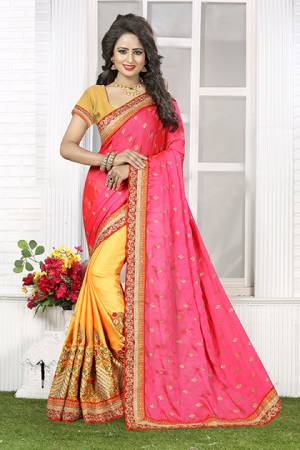 Enhnace Your Ethnic Beauty With This Saree In Traditional Bright Colors In Pink And Yellow. This Saree Is Fabricated On Crepe Silk Paired With Yellow Colored Blouse. Buy This Pretty Saree And Flaunt Your Ethnic Look Pairing It UP With A Maang Tika And Earrings. 