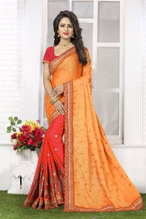 Orange And Red Induces The Perfect Summery Appeal To Any Outfit. Add This Oarnge And Red Colored Saree Paired With Red Colored Blouse Fabricated On Crepe Silk Which Is Soft Towards Skin So That You Can Carry It All Day Long  Beautify With A High Shine Gloss Over Your Red Lips For A Glamourous Outlook.  