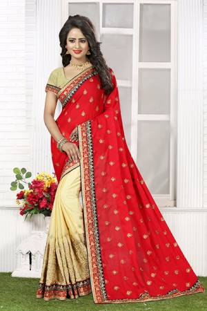 An Evergreen Color Combination In Saree That Is Loved By All Women Out There. Grab This Red And Cream Colored Saree Fabricated On  Crush Chiffon Which Is Light In Weight  Durable And Easy To Care For. Add This Pretty Saree To Your Wardrobe Now. 