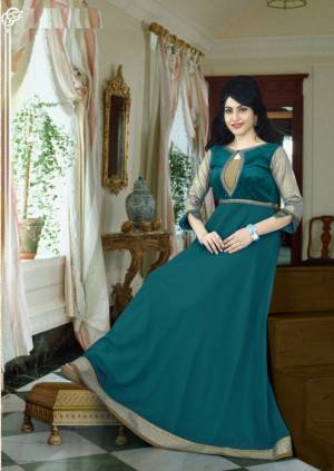 Look Beautiful In This Pine Green Colored Gown Fabricated On Georgette. This Gown Is Light In Weight And Also It Is Durable. Pair This Beautiful Floor Length Gown With Elegant Earrings And Complete The Look.