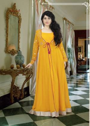 Quite A Different Color To Add Up To Your Wardrobe This Summer. Grab This Musturd Yellow Colored Floor Length Gown With Jacket Styled Pattern. This gown Is Fabricated On Georgette Which Is Light In Weight and Comfortable To Carry All Day Long.