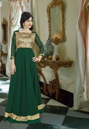 Grab This Elegant Bottle Green Colored Gown With Beautiful Yoke Pattern. This Gown Is Fabricated On Georgette. You Can Pair Up This Floor Length Gown With Beige Colored Dupatta For An Ethnic Look. 