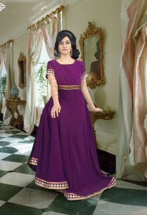 Add This Purple Colored Gown Fabricated On Georgette With A Very Simple And Elegant Yoke Pattern With Lace Borders. This Gown Is Light In Weight And Easy To Carry All Day Long. Buy This Gown Now.