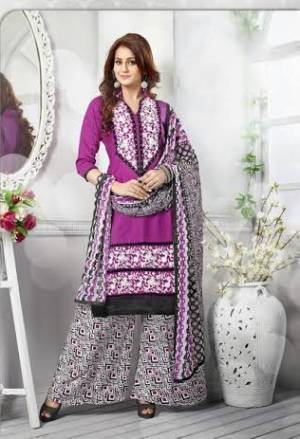 Go Casual This Summer With This Purple Colored Suit Paired With Black And White Colored Bottom And Dupatta. This Pretty Suit Is Fabricated On Cotton Which Light Weight and Easy To Carry All Day Long  Paired With Chiffon Dupatta. Buy It Now. 