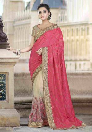 Dress Up Ia Subtle Look In This Pink Amd Cream Colored Designer Saree With  Elbaorately Embroidered For a perfect Balance And Look Ethereal. Buy This Lovely Saree Now.