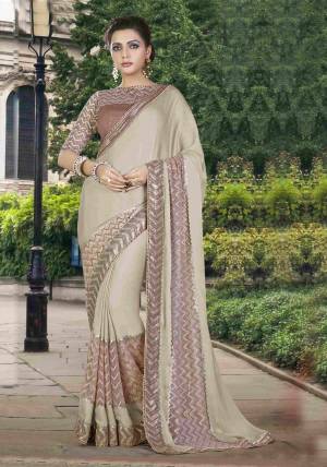 Blush Neutral Is A Shade That Suits Everyone. This Pale Khaki Colored Saree With A Perfect Touch Of Dazzle Is Sure To Give You A Star-Diva Like Appearance. 