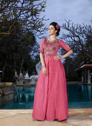 Look Pretty In This Pink Colored Gown Fabricated On Satin Silk Beautified With Embroidery Over The Yoke Front And Back. This Lovely Gown Will Make You Earn Lots Of Compliments From Onlookers. Buy Now.