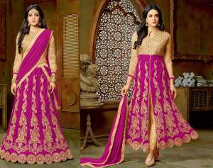 Bright And Visually Appealing, Grab This Lovely Attire In Beige Colored Top And Bottom Paired With Magenta Pink Colored Skirt And Dupatta. As It Comes With Two Bottoms, Get This Stitched As Pants With Anrakali Or Make Lehenga Out Of Its Skirt. Buy This Suit Now.