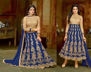 Attract All With This Attractive Colored Attire. Grab This Beige Colored Top And Bottom Paired With Blue Colored Skirt And Dupatta. Get This Tailored As Per Your Desired Comfort Into An Anarkali Suit Or As A Lehenga Choli. Grab It Before The Stock Ends.