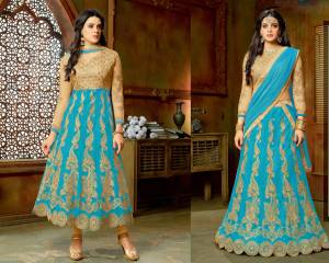 Enhance Your Beauty With This Beautiful Attire In Beige Colored Top And Bottom Pared With Turquoise Blue Colored Lehenga And Dupatta. You Can Get This Stitched As An Anarkali Suit Or As A Lehenga Choli. Grab This Lovely Offer Now.