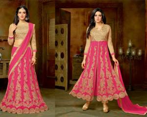 Shine Bright With This Fuschia Pink Colored Attire. Its Top And Bottom Are In Beige Color Paired With Fuschia Pink Colored Lehenga And Dupatta. It Is Light Weight And Easy To Carry All Day Long.
