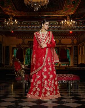 You Will Certainly Steal All The Limelight From From The Bride At The Next Wedding You Attend Wearing This Birght And Beautiful Lehenga Choli. This Red Colored Designer Lehenga Choli Is Fabricated On Art Silk With Net Fabricated Dupatta. This Lehenga Choli Is Easy To Carry Throughout The Gala. Buy It Now.