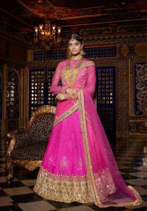 Flaunt Your Pretty Ethnic Side With This All Over Pink Colored Lehenga Choli. Its Designer Blouse Is Fabricated On Art Silk And Net Paired With Art Silk Fabricated Lehenga And Net Fabricated Dupatta . Pair This Up with A Maang Tika For A Complete Ethnic Look. Buy This Lehenga Choli Now.