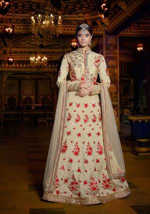Sophisticated And Elegant, This Beige Colored Lehenga Choli Will Definitely Earn You Lot Of Compliments From Onlookers. This Designer Lehenga Choli Is Fabricated On Art Silk Paired With Net Fabricated Dupatta. It Is Beautified With Contratsing Colored Embroidery All Over Making The Lehenga Attractive. Buy It Now Before The Stock Ends.