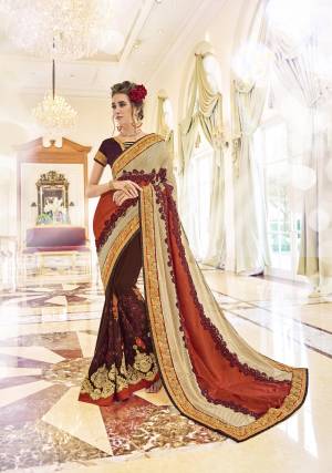 Grab This Brown And Multi Colored Designer Saree For Any Functions, Parties Or Occasions. This Dynamic Saree Is Decorated On Georgette And Is Hooked Up With Brown Colored Banglori Silk Blouse. Grab It Now Before It's Too Late