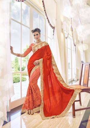 You Will Definitely Steal The Show, Wearing This Red And Orange Colored Saree. Made From Art SIlk And Net, This Saree Will Stay Very Soft Against Your Skin. Featuring An Attractive Embroidery , Zari Border And Fancy Pattern, This Saree Can Be Worn With Matching Accessories For A Beautiful Look. Wear It Now