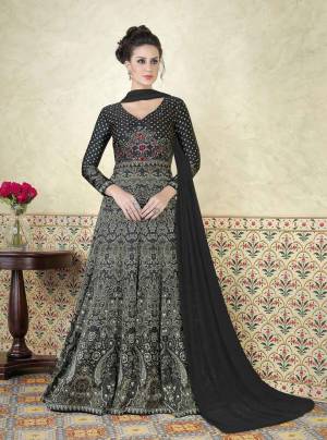 This Amazing Black Colored Satin Suit It Comes With Same Color Santoon Bottom And Chiffon Dupatta. This Suit Is Exquisite And Is Meant For Those Special Evenings.The Style Is Modern And Very Lady Like. Adapt To This New Fashion Range Now. 