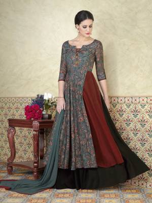 Grab This Pretty Salwar Kameez In Light Teal Blue And Rust Color Paired With  Black Colored Bottom And  Light Teal Blue Colored Dupatta. Its Top Are Fabricated On Tussar Silk Paired With Santoon Bottom And  Chiffon Dupatta.This Lovely  Suit Just For You.Buy This Amazing Suit Now.
